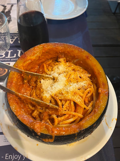 Authentic Roman amatriciana pasta served at a traditional fraschetta