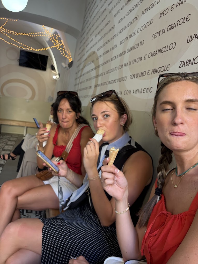 Guests enjoying artisan gelato during a Rome food experience