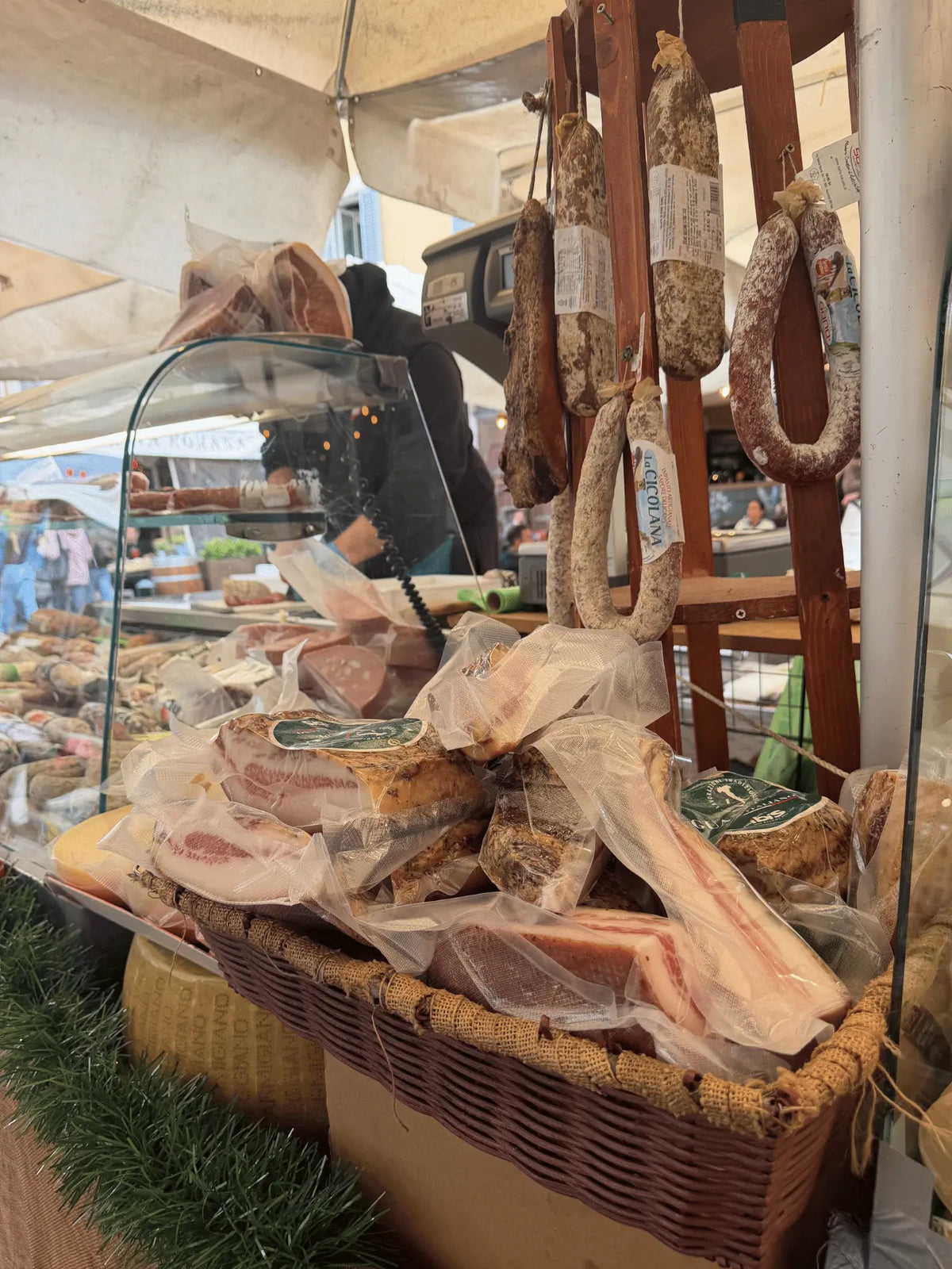 Traditional Italian cured meats at a Roman food market