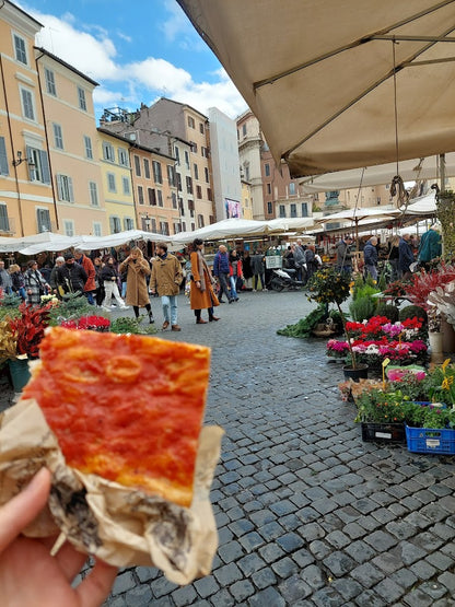 Pizza al taglio from a Trastevere street food experience in Rome