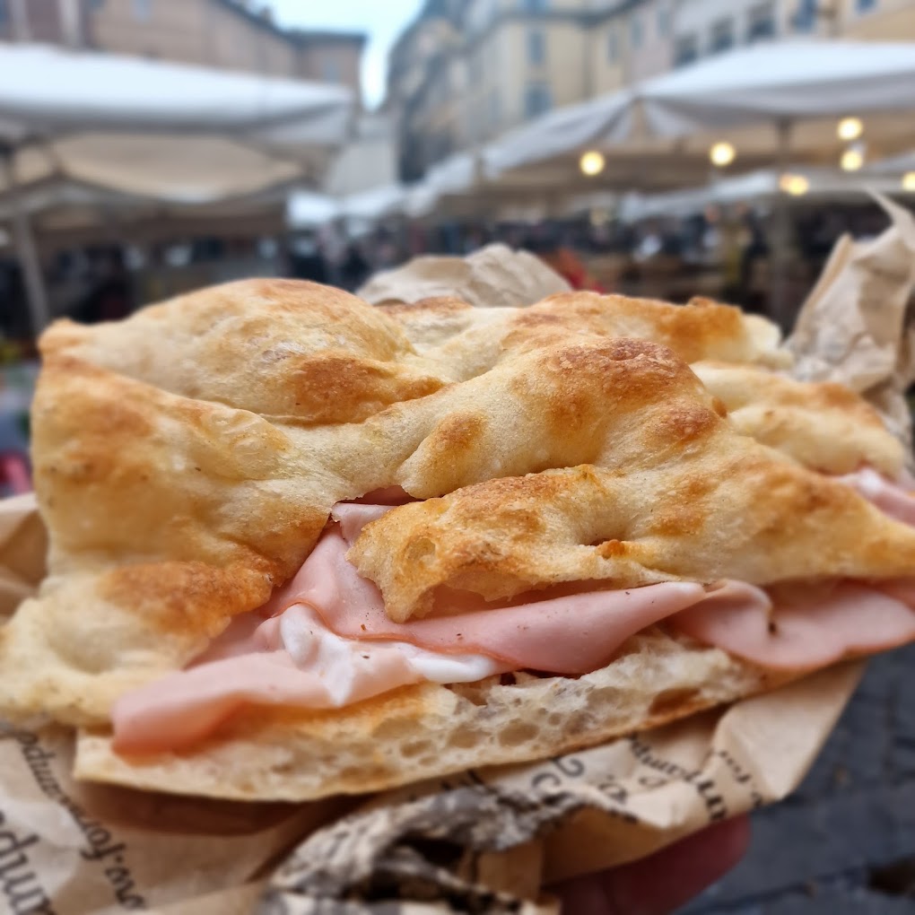 Roman focaccia with mortadella enjoyed during a Rome food experience