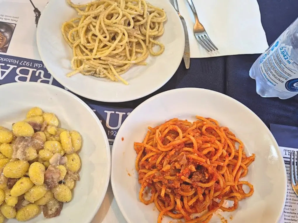 A selection of traditional Roman pasta dishes served at a local restaurant