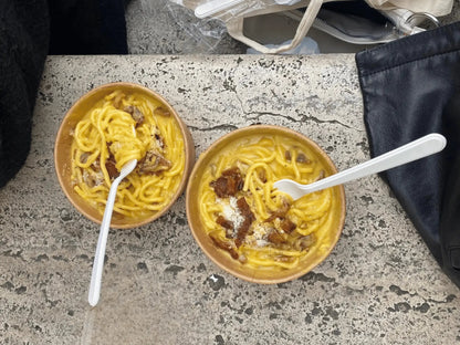 Traditional Roman pasta enjoyed with a view over Rome