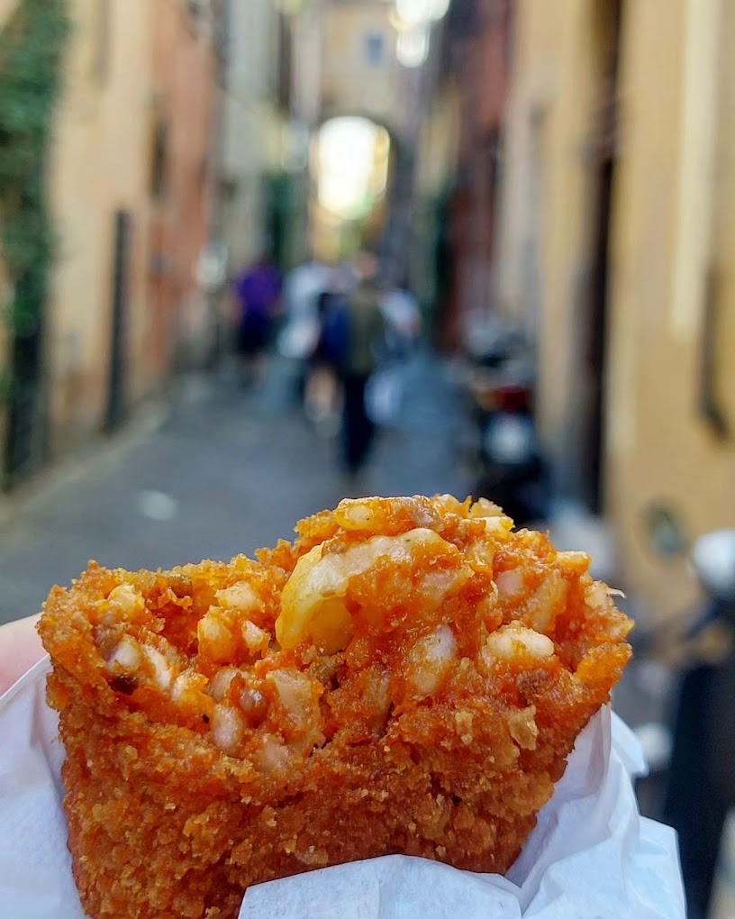 Traditional Roman supplì in Trastevere street food