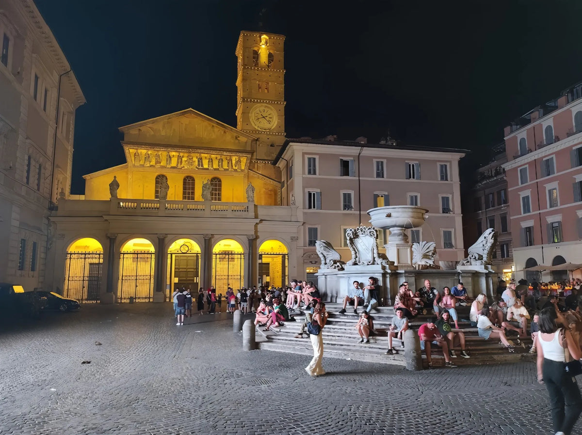 Piazza Santa Maria in Trastevere at night in Rome