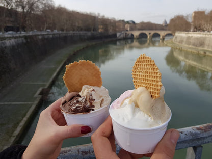 Italian gelato enjoyed near the Tiber in Rome